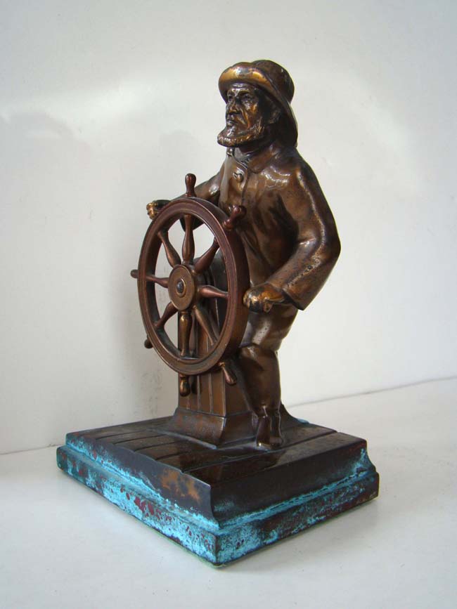 A single bookend depicting a "Captain at the helm" made by Ronson circa 1930 — image 2